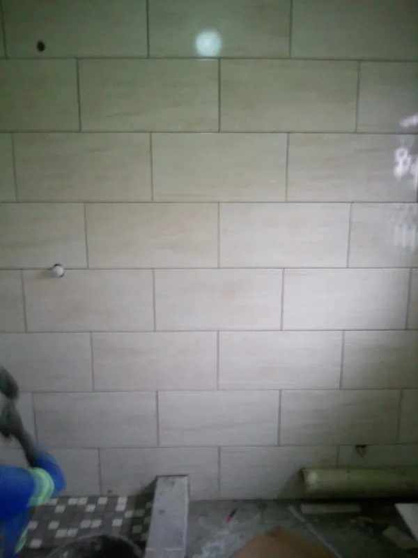 Close-up of professionally installed wall tile pattern
